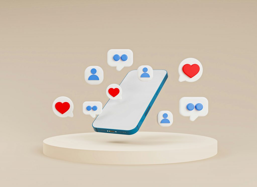 Smartphone mit Social-Media-Symbolen wie Herz, Chat und Nutzer-Icons.